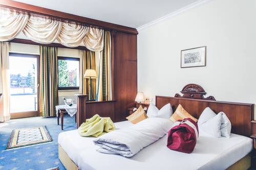 Imagen de la habitación del Hotel Schlosshotel Seewirt. Foto 9