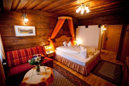 Imagen de la habitación del Hotel Schlosshotel Seewirt. Foto 11