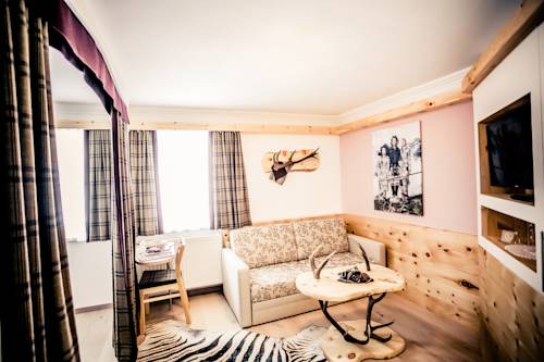 Imagen de la habitación del Hotel Schlosshotel Seewirt. Foto 12