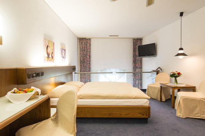 Imagen de la habitación del Hotel Schlosshotel Weilburg. Foto 9