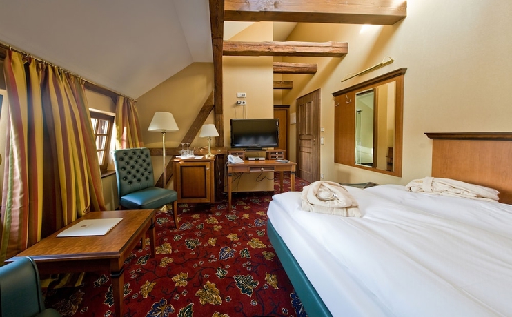 Imagen de la habitación del Hotel Schlosshotel Wendorf. Foto 8