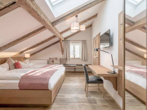 Imagen de la habitación del Hotel Schneiderwirt. Foto 7