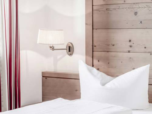 Imagen de la habitación del Hotel Schneiderwirt. Foto 9