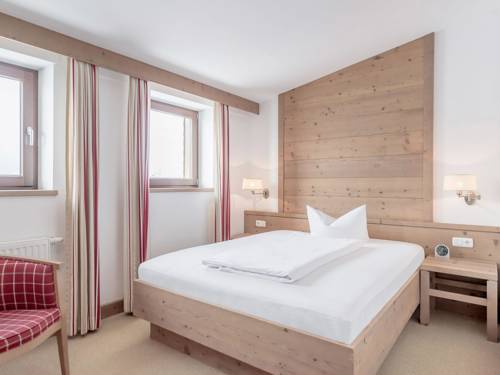Imagen de la habitación del Hotel Schneiderwirt. Foto 11