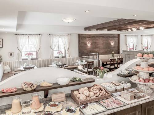 Imagen de la habitación del Hotel Schneiderwirt. Foto 12