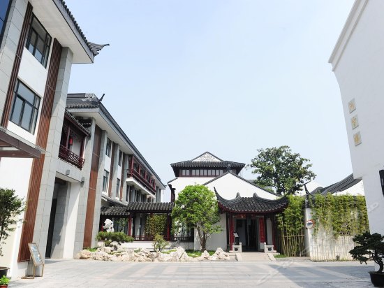 Imagen de los exteriores del Hotel Scholars PingJiangFu Suzhou. Foto 10
