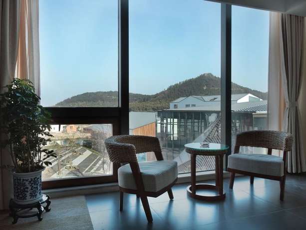 Imagen de los interiores del Hotel Scholars Shushan Hot Springs Resort. Foto 19