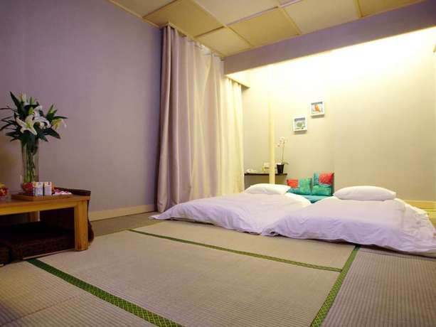 Imagen de la habitación del Hotel Scholars Shushan Hot Springs Resort. Foto 11