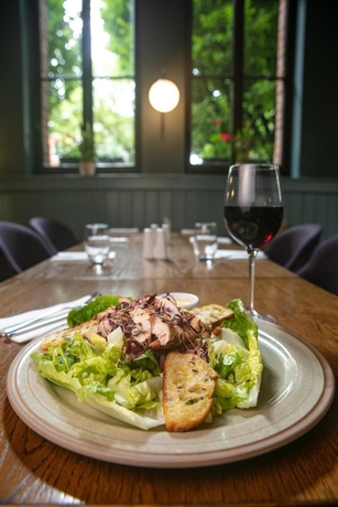 Imagen del bar/restaurante del Hotel Schoolhouse. Foto 11