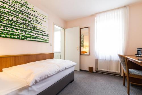 Imagen de la habitación del Hotel Schöne Aussicht, Bergen Enkheim. Foto 7