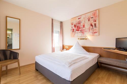 Imagen de la habitación del Hotel Schöne Aussicht, Bergen Enkheim. Foto 8