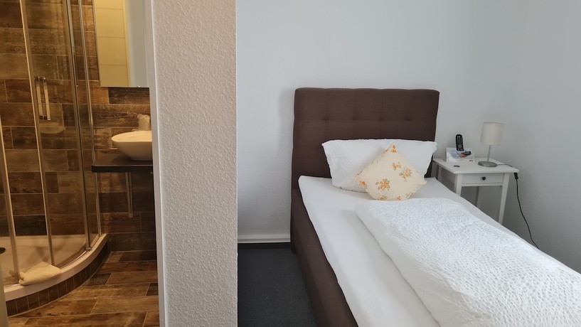 Imagen de la habitación del Hotel Sch&ouml;ne Aussicht, Schleusingen. Foto 7