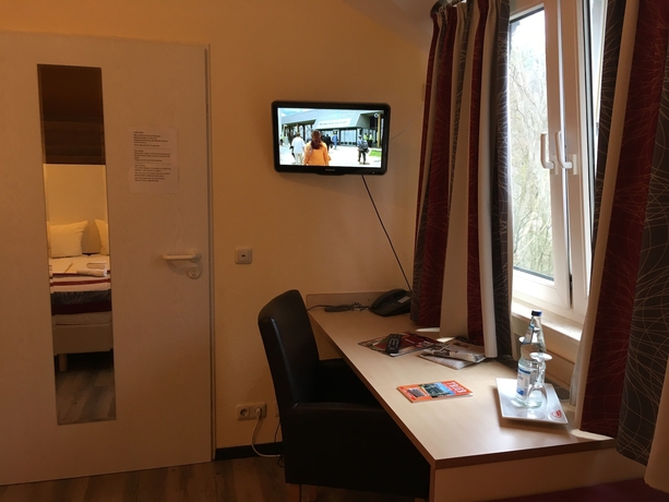 Imagen de la habitación del Hotel Schroeders Stadtwaldhotel. Foto 8