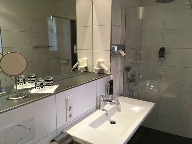 Imagen de la habitación del Hotel Schroeders Stadtwaldhotel. Foto 14