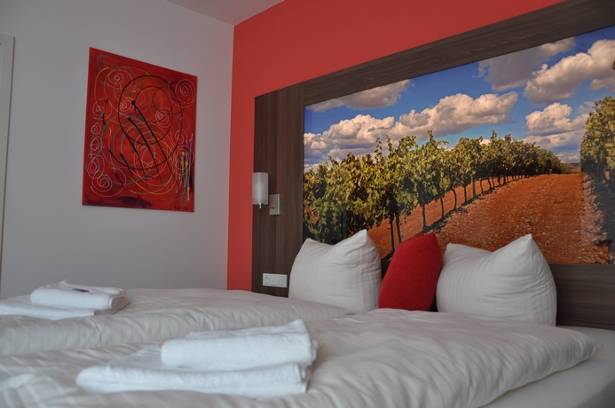 Imagen de la habitación del Hotel Schroeders Wein-style-hotel. Foto 6