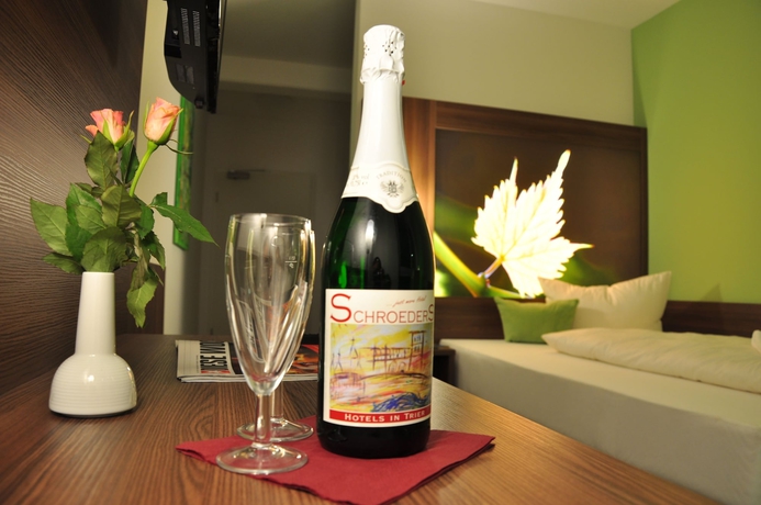 Imagen de la habitación del Hotel Schroeders Wein-style-hotel. Foto 10