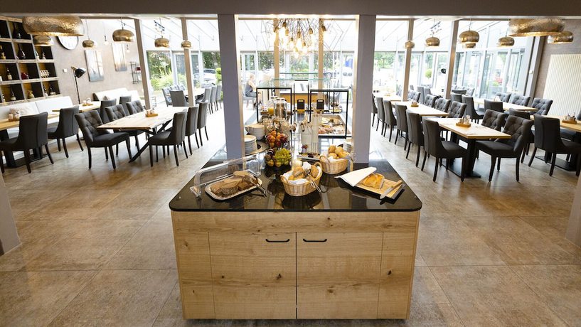 Imagen del bar/restaurante del Hotel Sch&uuml;tzenhof, M&uuml;llenacker. Foto 5