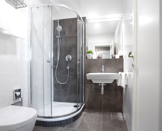 Imagen de la habitación del Hotel Schwaiger, Praga. Foto 16