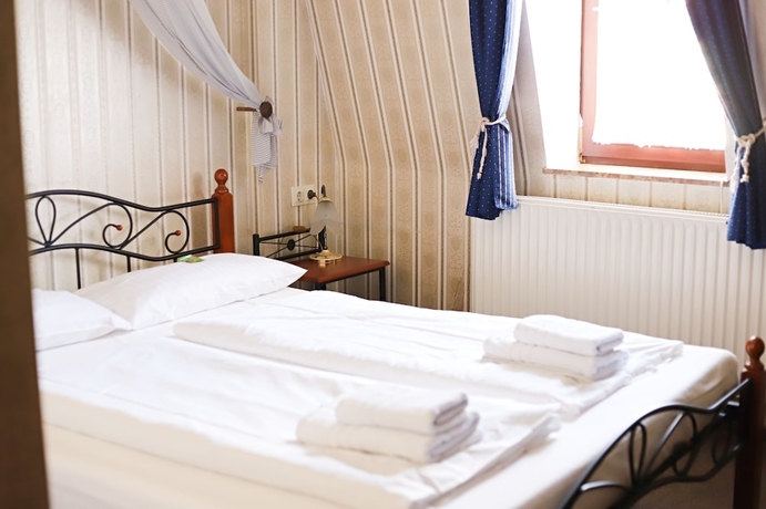 Imagen de la habitación del Hotel Schwarzer Adler, Rothenburg. Foto 4