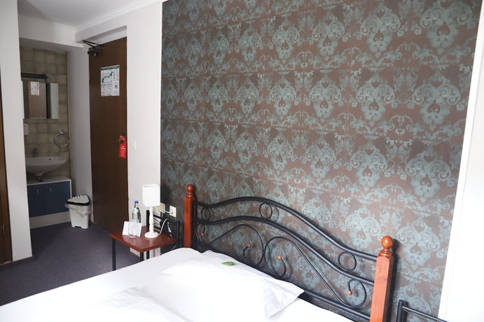 Imagen de la habitación del Hotel Schwarzer Adler, Rothenburg. Foto 12