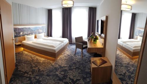 Imagen de la habitación del Hotel Schwarzer Adler Stendal. Foto 5
