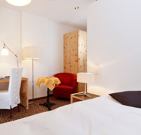 Imagen de la habitación del Hotel Schweizerhaus Swiss Quality. Foto 2
