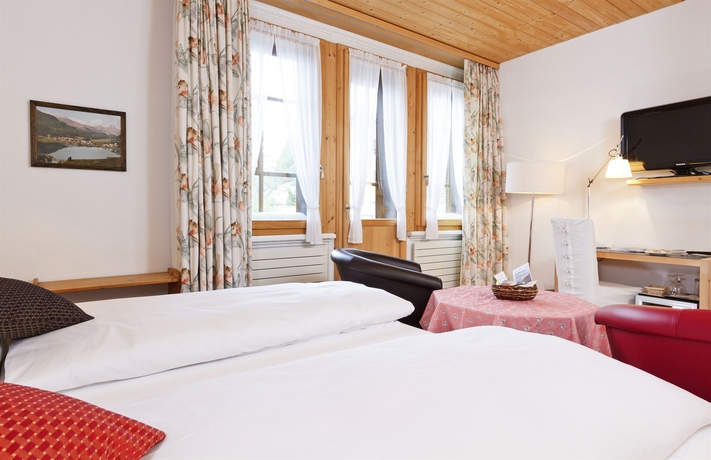 Imagen de la habitación del Hotel Schweizerhaus Swiss Quality. Foto 3