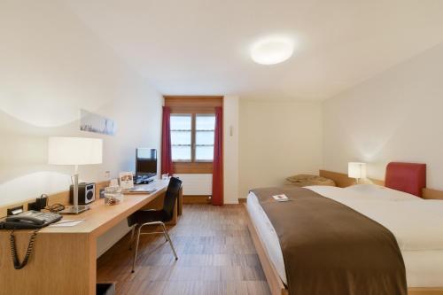 Imagen de la habitación del Hotel Schweizerhof Lenzerheide. Foto 9