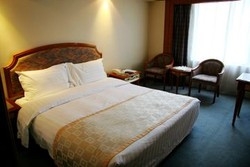 Imagen de la habitación del Hotel SciTech Hotel. Foto 2