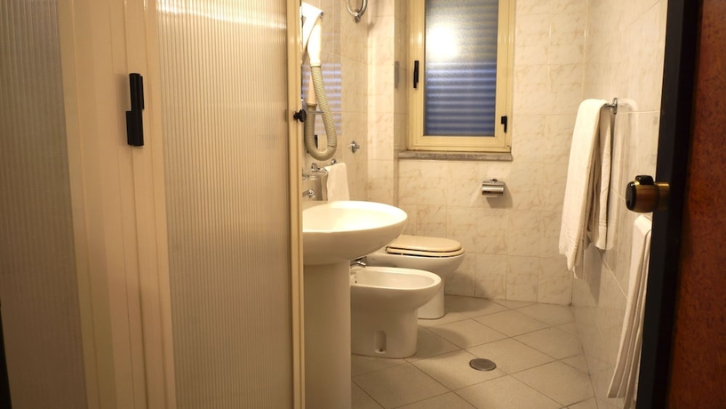 Imagen de la habitación del Hotel Scigliano. Foto 13