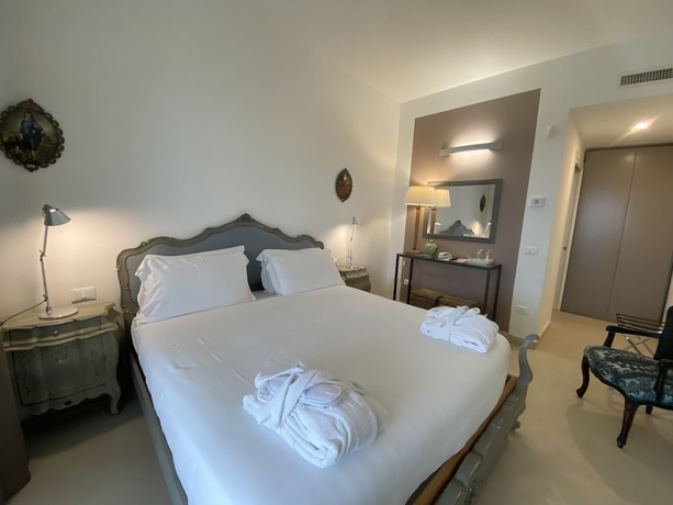 Imagen de la habitación del Hotel Scilla Maris Charming Suites-Restaurant. Foto 3