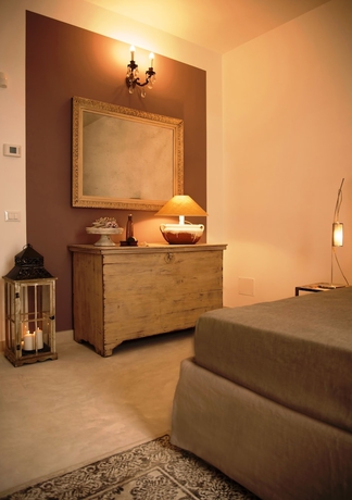Imagen de la habitación del Hotel Scilla Maris Charming Suites-Restaurant. Foto 7
