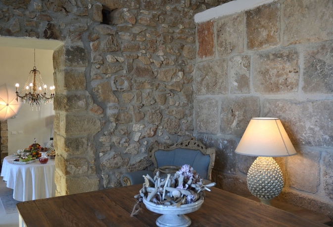 Imagen de los interiores del Hotel Scilla Maris Charming Suites-Restaurant. Foto 14