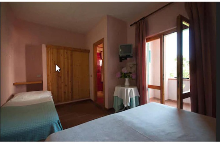 Imagen de la habitación del Hotel Scintilla, San Teodoro . Foto 4