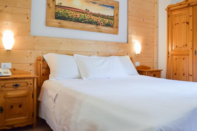 Imagen de la habitación del Hotel Scoiattolo, Falcade. Foto 8