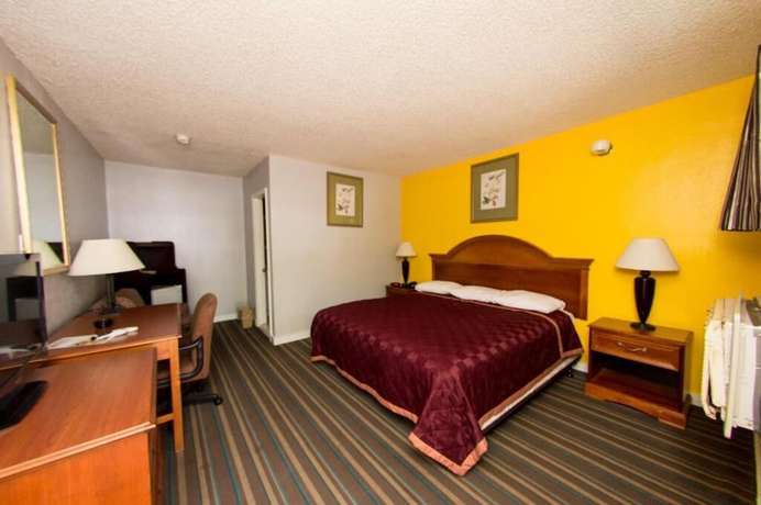 Imagen de la habitación del Hotel Scottish Inn and Suites, Bensalem. Foto 5