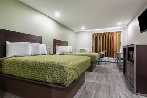 Imagen de la habitación del Hotel Scottish Inn and Suites. Foto 1