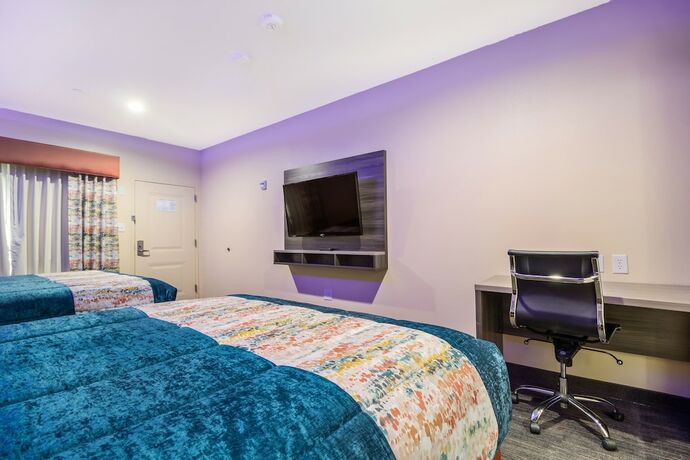 Imagen de la habitación del Hotel Scottish Inn and Suites Houston Willowbrook. Foto 14