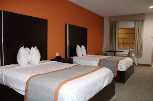 Imagen de la habitación del Hotel Scottish Inn and Suites - Iah Airport. Foto 3