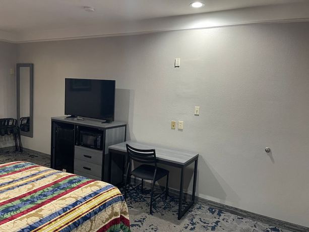 Imagen de la habitación del Hotel Scottish Inns and Suites Alvin. Foto 2