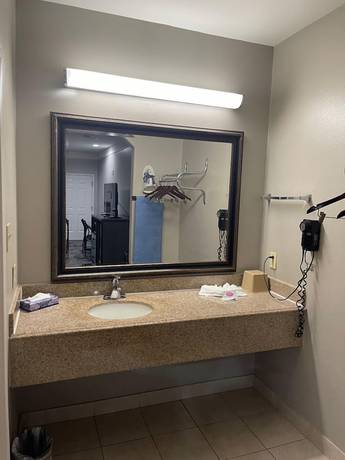 Imagen de la habitación del Hotel Scottish Inns and Suites Alvin. Foto 5