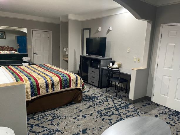 Imagen de la habitación del Hotel Scottish Inns and Suites Alvin. Foto 11