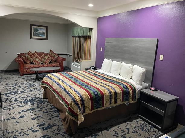 Imagen de la habitación del Hotel Scottish Inns and Suites Alvin. Foto 12