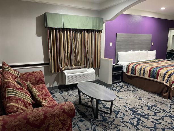 Imagen de la habitación del Hotel Scottish Inns and Suites Alvin. Foto 13