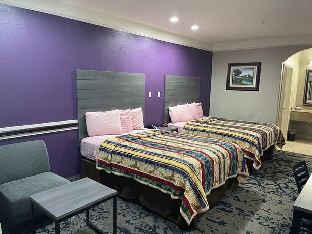 Imagen de la habitación del Hotel Scottish Inns and Suites Alvin. Foto 14