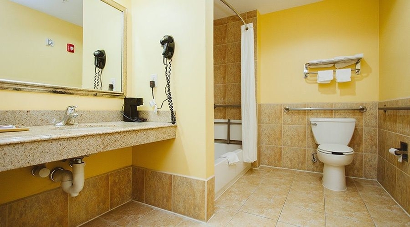 Imagen de la habitación del Hotel Scottish Inns and Suites East Sam Houston Pkwy. Foto 2