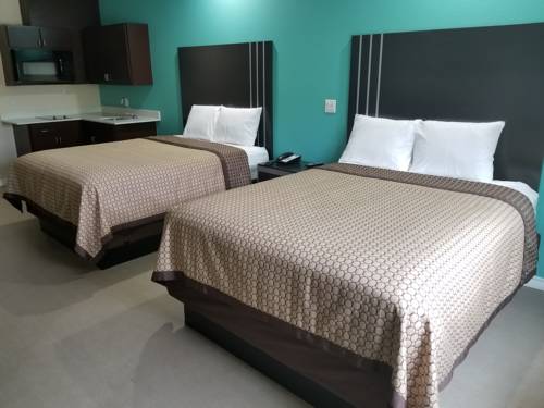 Imagen de la habitación del Hotel Scottish Inns and Suites. Foto 1