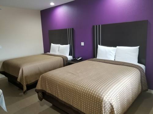 Imagen de la habitación del Hotel Scottish Inns and Suites. Foto 2