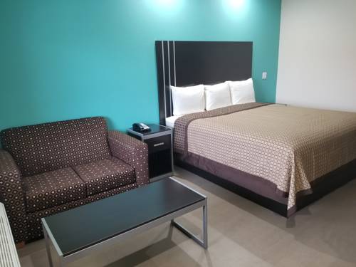 Imagen de la habitación del Hotel Scottish Inns and Suites. Foto 4