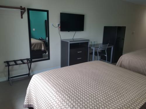 Imagen de la habitación del Hotel Scottish Inns and Suites. Foto 5